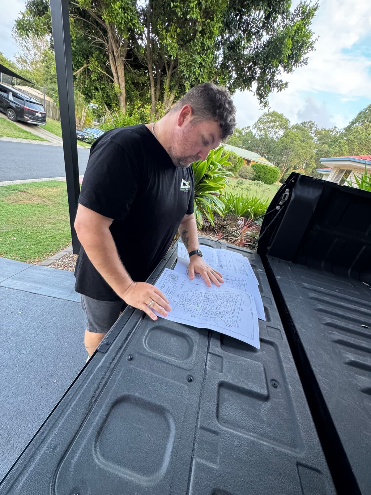 Luke Buxton reviewing survey plans